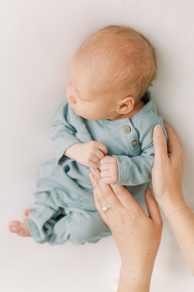 baby in blue newborn session in Lancaster, serving Harrisburg, Hershey