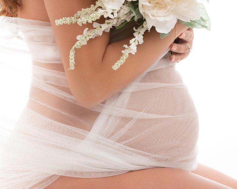 Maternity pregnancy photo mother in pink tulle