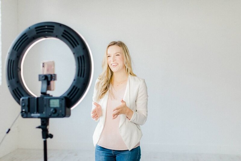 Joy Michelle recording video with ring light