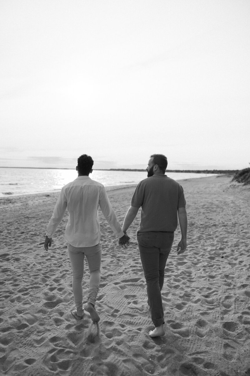 VT Wedding Photographer | Sincerely Liz Photography Documentary Wedding, Engagement, Elopement, Maternity and Newborn Photographer in New England | Engaged couple walking at a New England beach