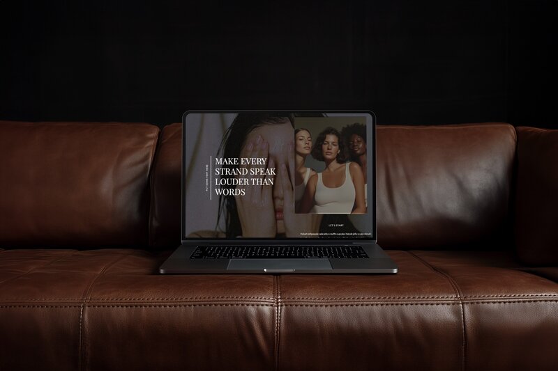 Macbook displaying Showit website template for photographers