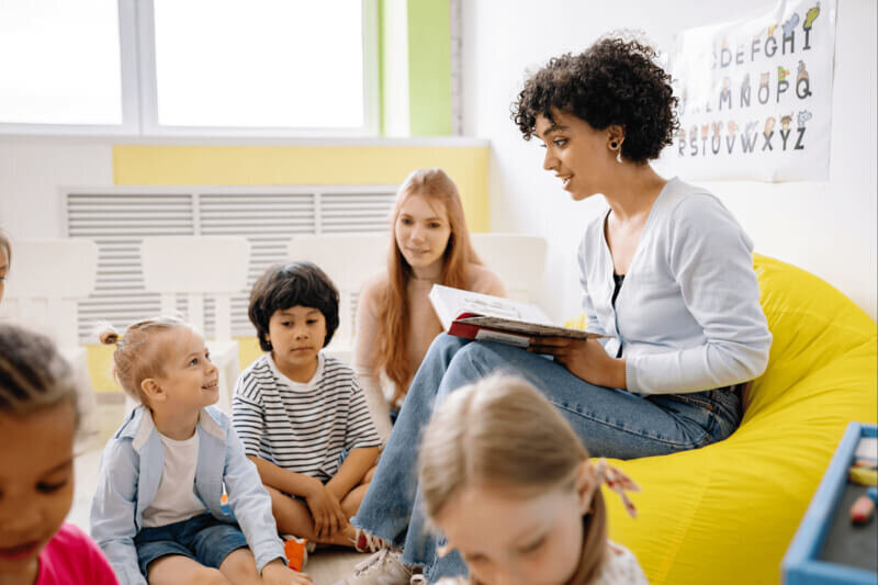 teacher reading to small children