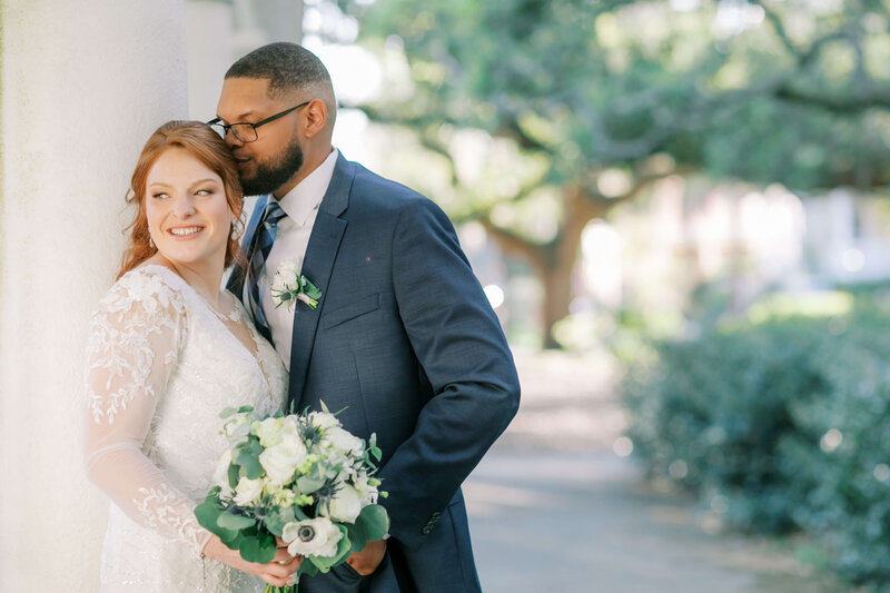 A beautiful sunset ceremony at Forsyth Park, with the couple exchanging vows in the golden hour light.