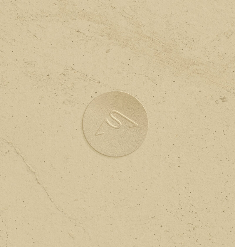 Embossed sticker with nature inspired logo mark
