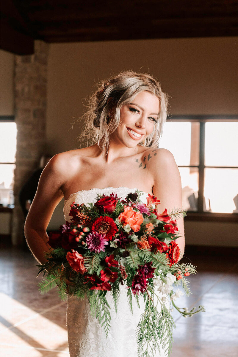 bride holding flowers