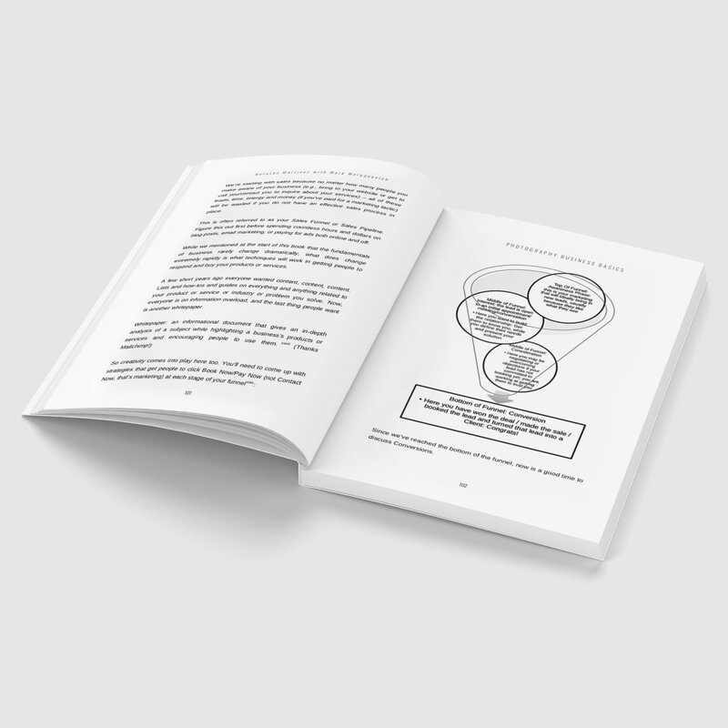 Photography Business Basics book opened on page featuring sales funnel diagram across from text in black and white