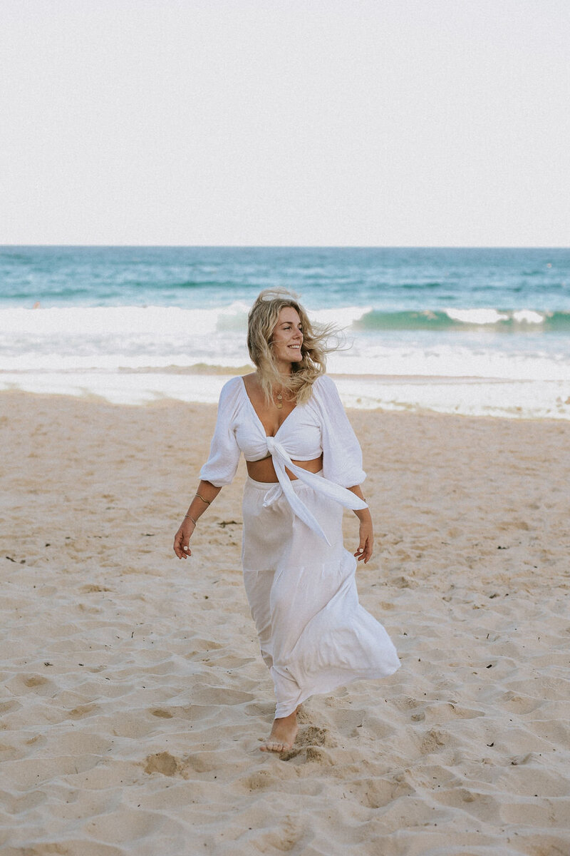Woman walking on the beach