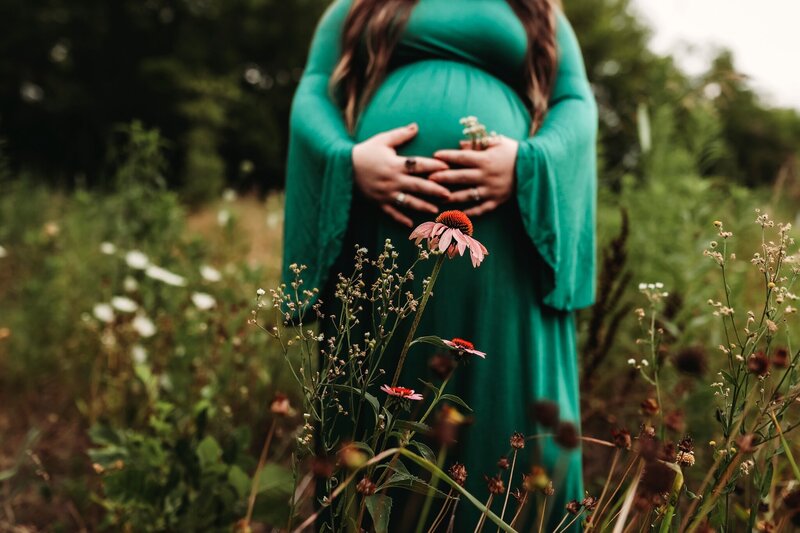 sunset summer maternity photo in field with yellow dress