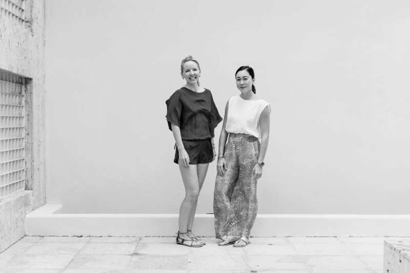 Black and white portrait of Wildseed Health founders Danielle and Leah, capturing their connection and commitment to wellness coaching.