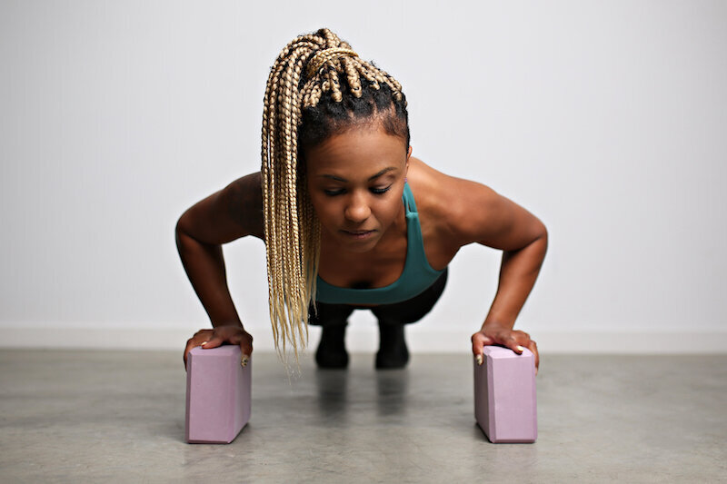 Personal Trainer hanging on fence