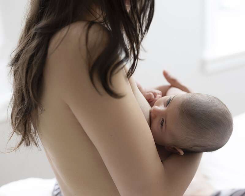 Portrait of a breastfeeding mother.