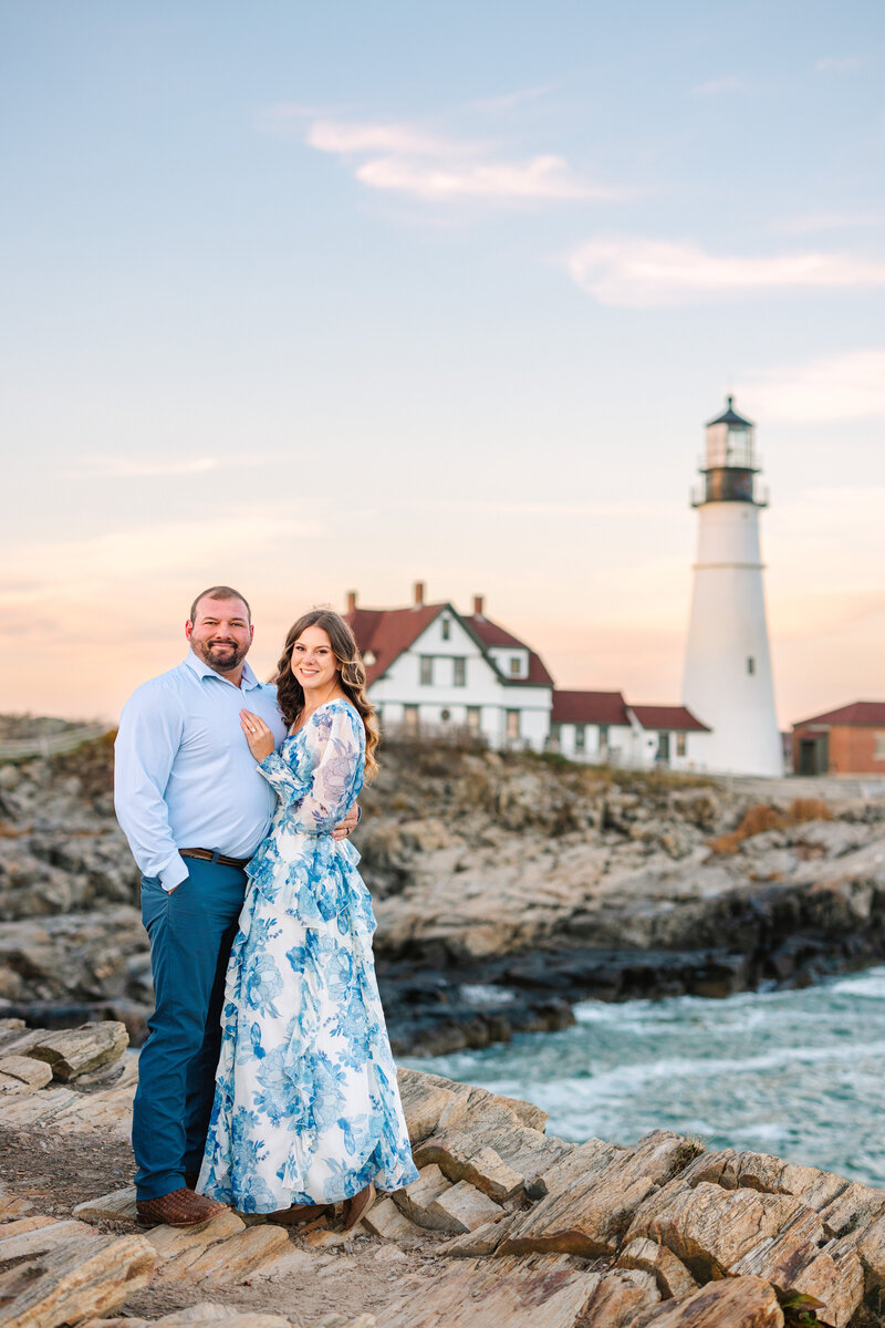 photo of a couple at portland head lighthouse