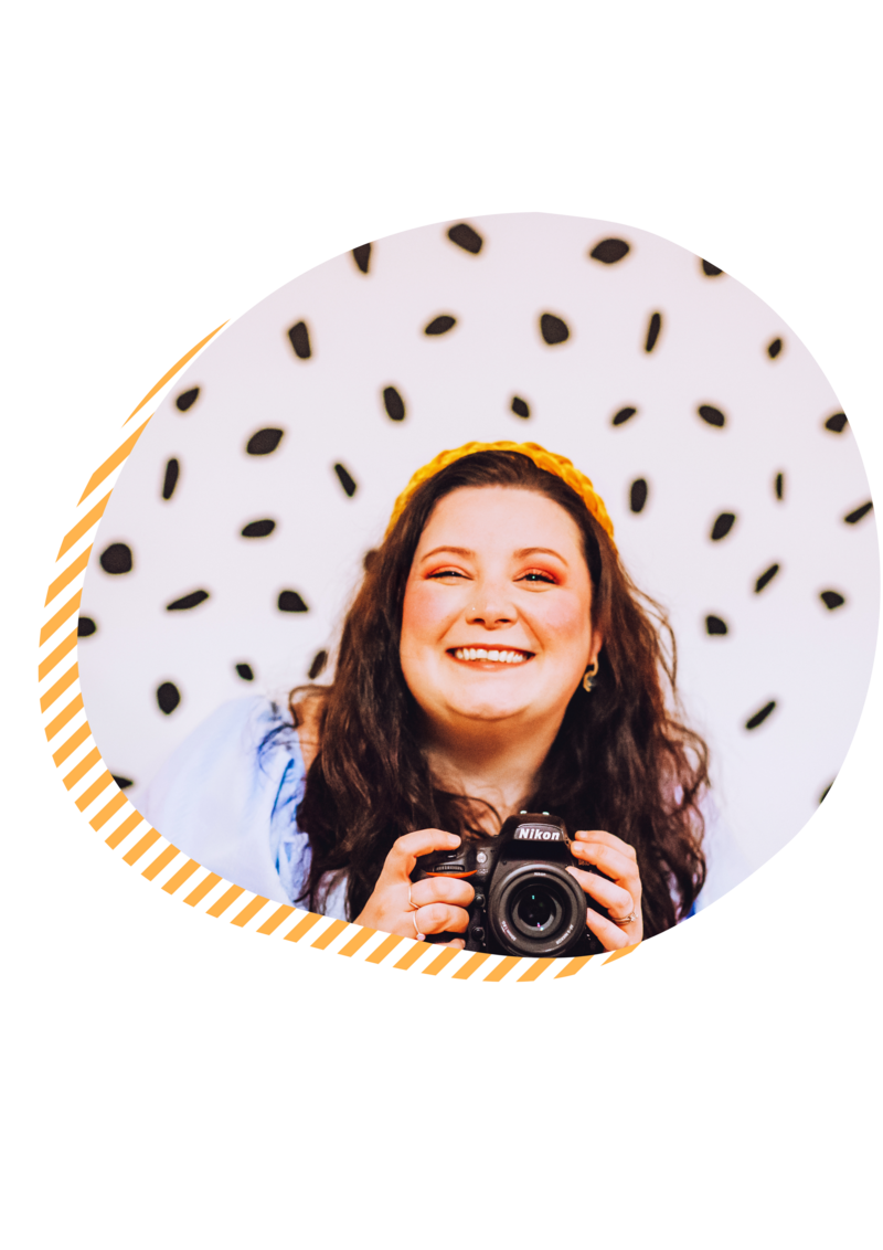 Jade holding a camera