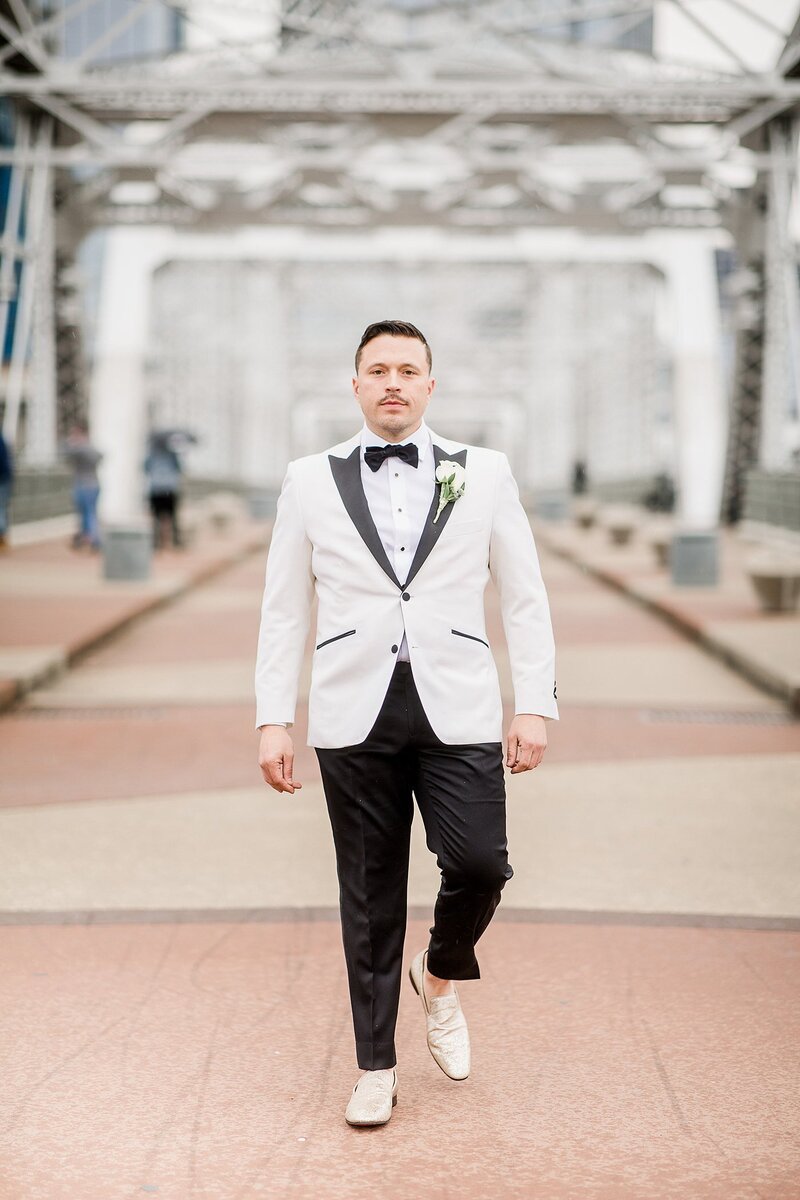 white tuxedo by Knoxville Wedding Photographer, Amanda May Photos