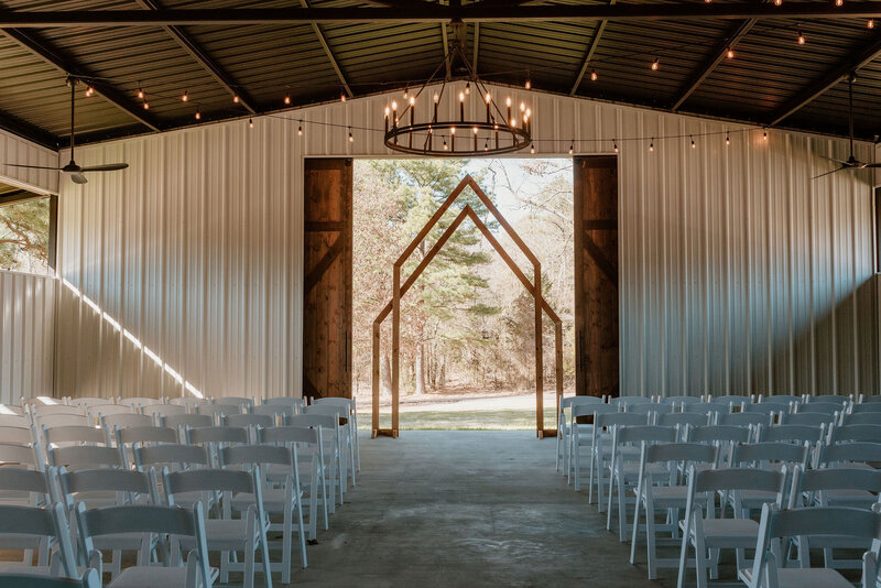 outdoor ceremoney rosewood venue tx venue near me modern rustic venue wood tables mount vernon tx