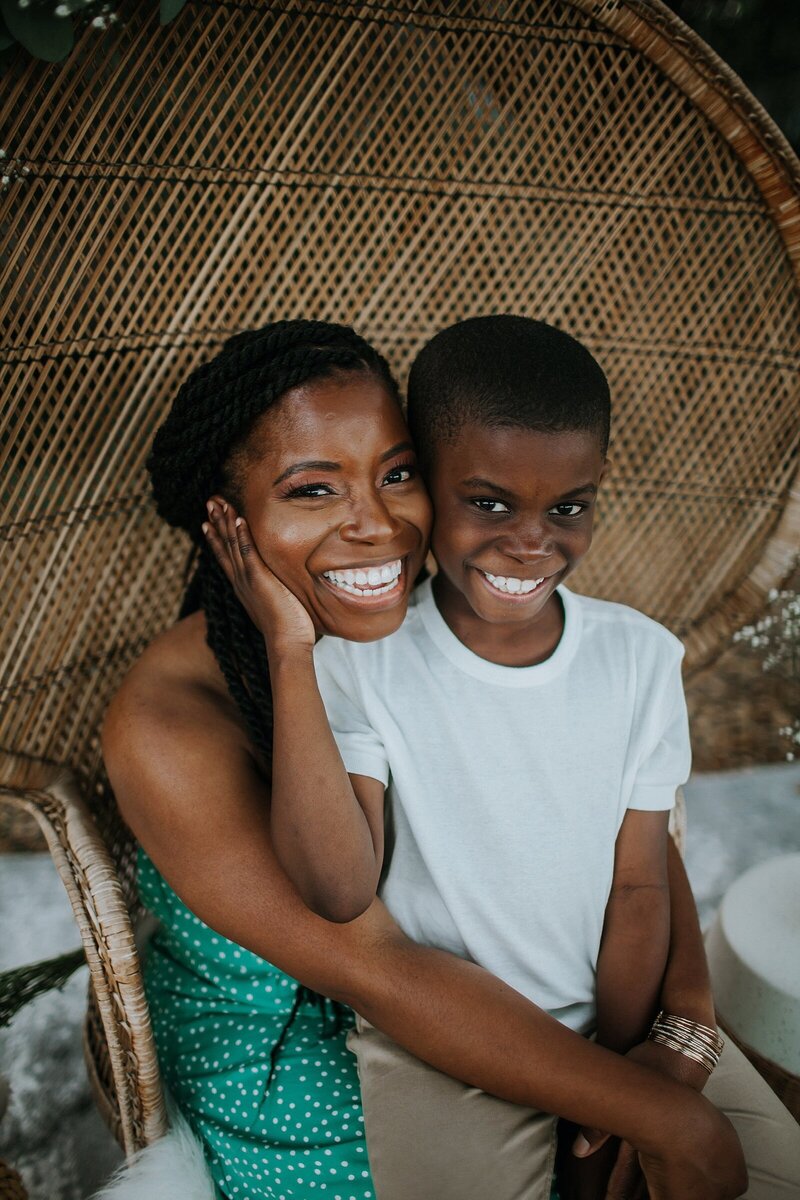 Theo and Yvette Henry smiling for mother's day.