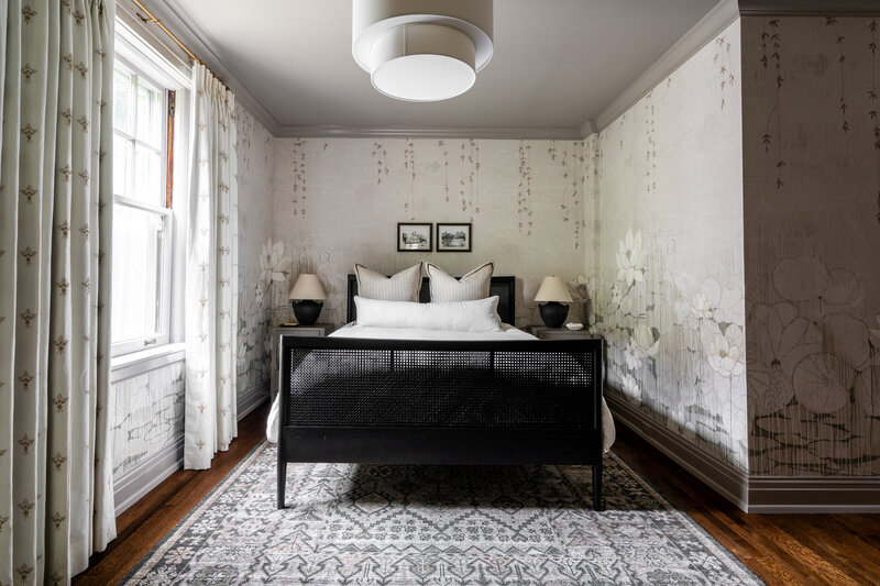 Bedroom with floral wallpaper and contrast trim