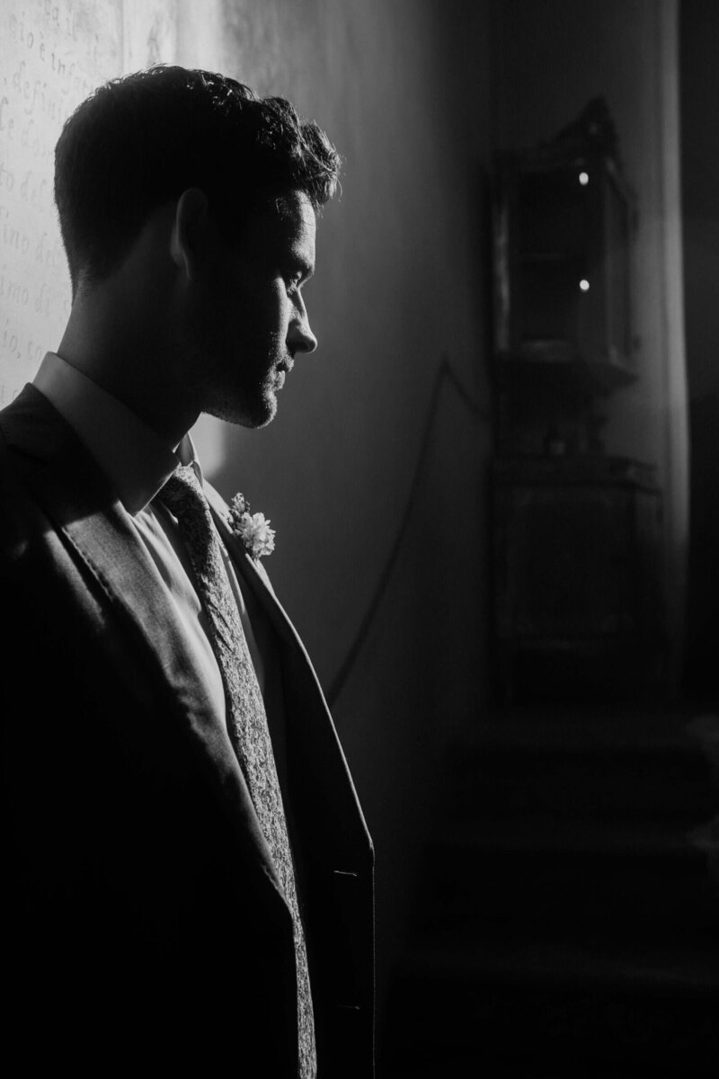 groom portrait borgo santo pietro roberto panciatici exclusive wedding photographer in tuscany