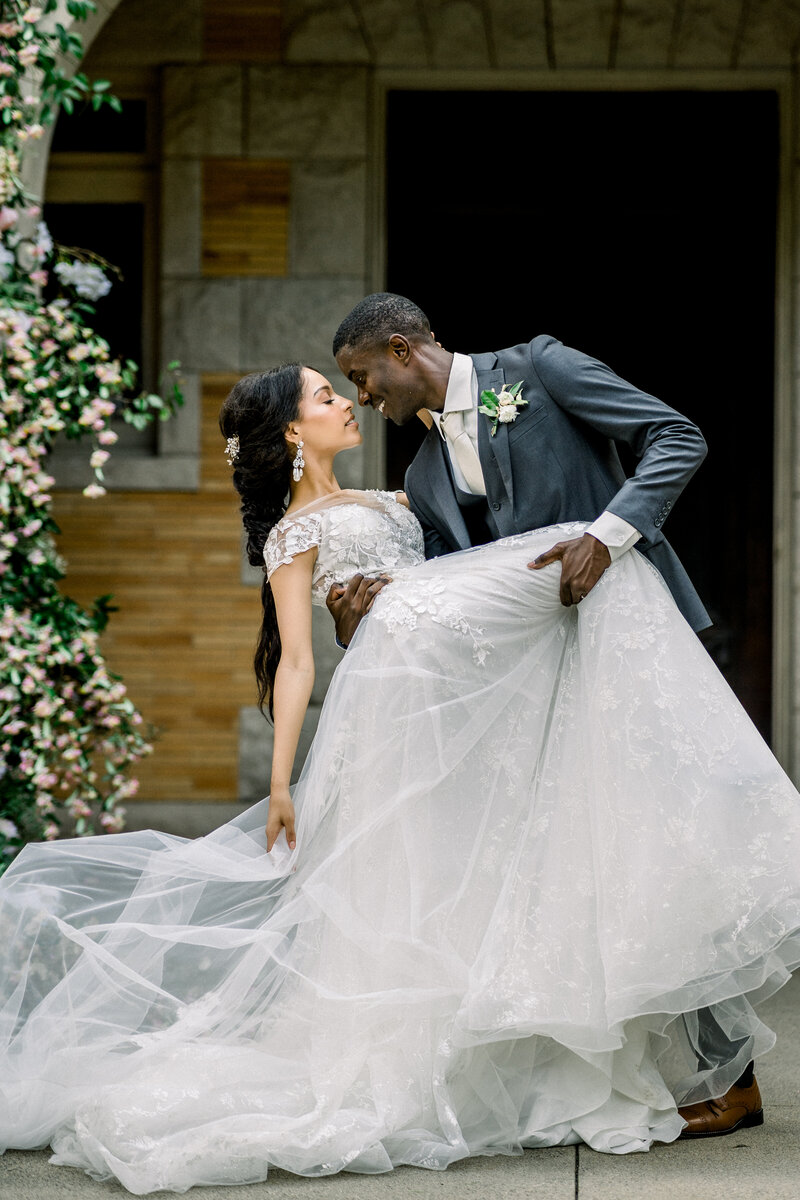 Tiffany Longeway Photography captures a stunning and romantic moment between the bride and groom at Chateau St. Jean in Sonoma Valley. The luxurious and historic charm of the venue, combined with the couple’s graceful pose, creates an enchanting scene, perfect for couples seeking an elegant and timeless setting for their wedding celebration.