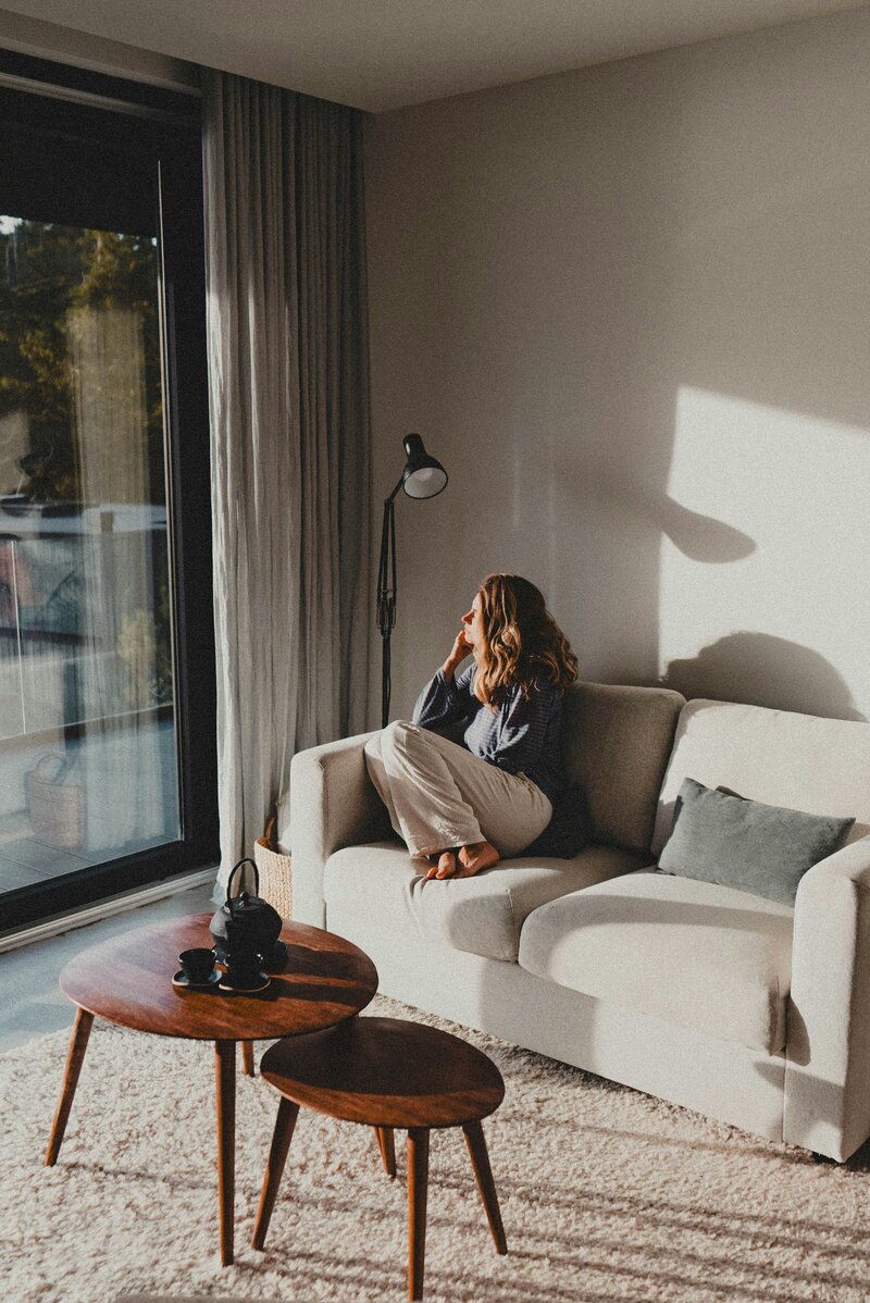 A woman using Safe and Sound Protocol at home in Denver