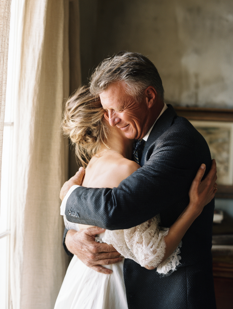 krista5123_father_of_the_bride_hugging_daughter_tightly_befor_5821704c-31fc-47a4-8fd9-ab05b9ca3634_3