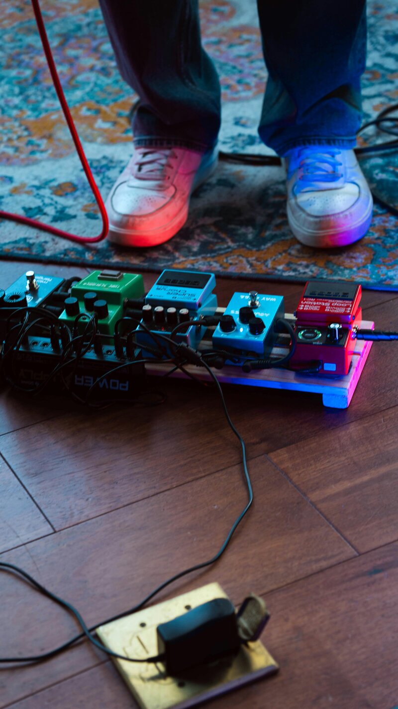 Live band karaoke setup with guitar pedals and instruments by The Tonic Connecticut cover band