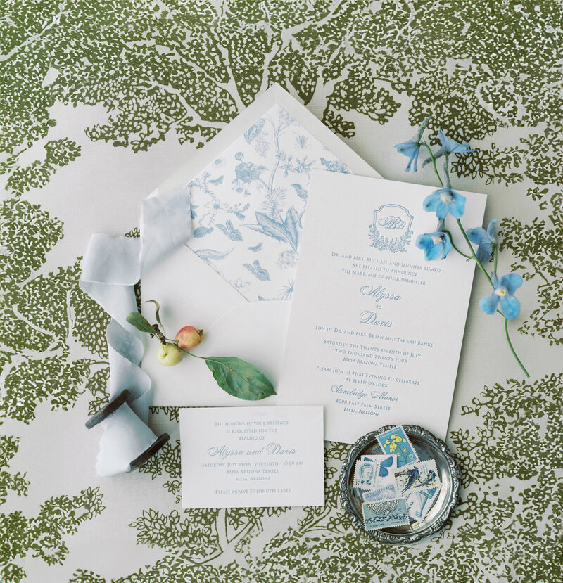 Luxury wedding photographer capturing elegant wedding announcements, featuring timeless calligraphy, floral accents, and fine art wedding details in Arizona.