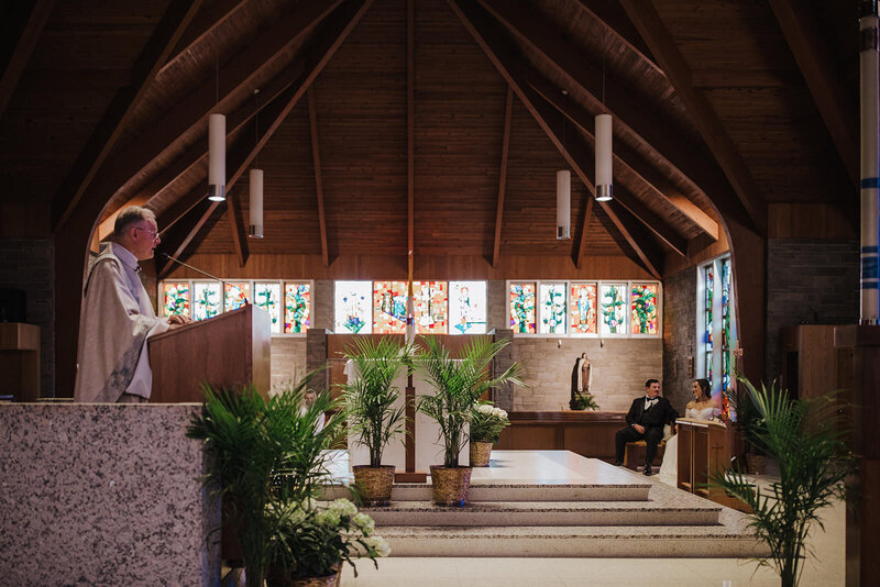 A priest standing at a pulpit