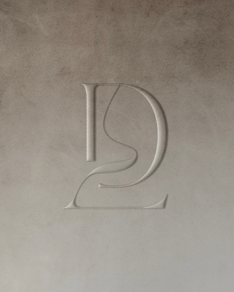 Stone embossed logo design for a stone furnishings and design studio