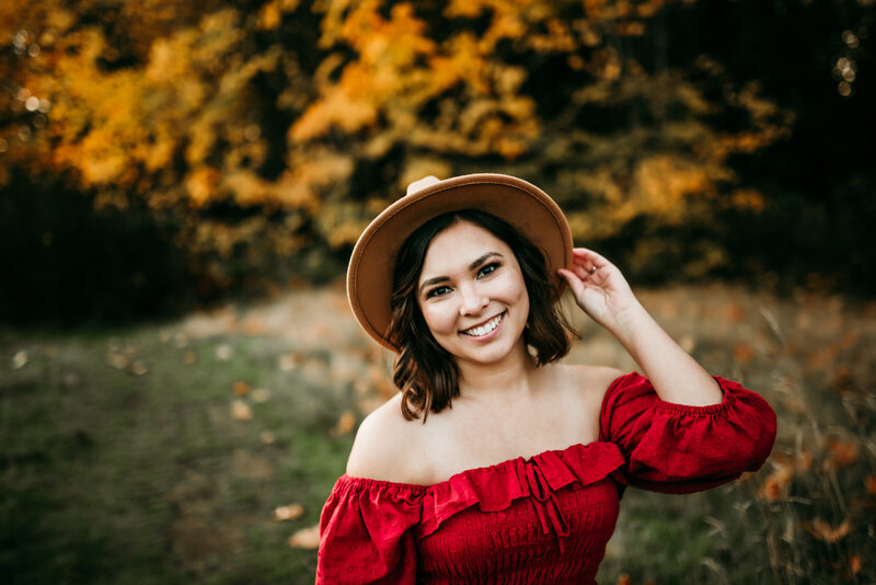 Woman in hat smiling