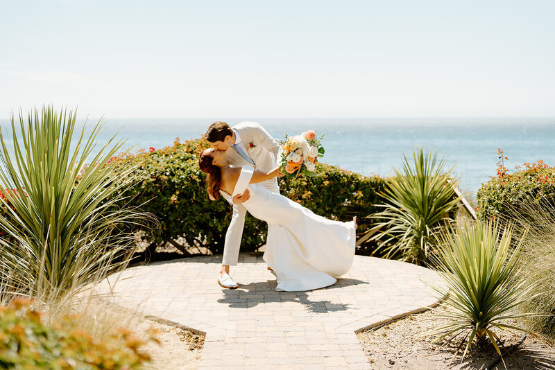 couple walking on a dirt path