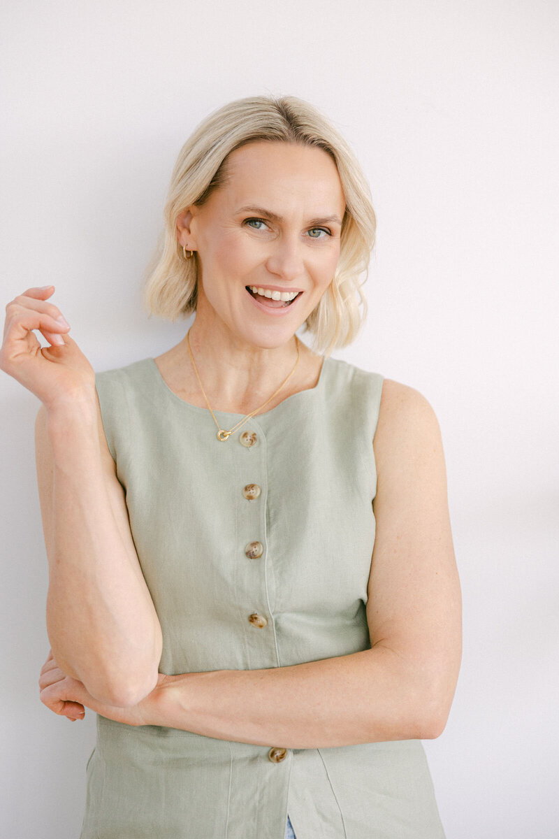 Zelda Green, entrepreneur, professional photographer and profit coach, smiling at camera