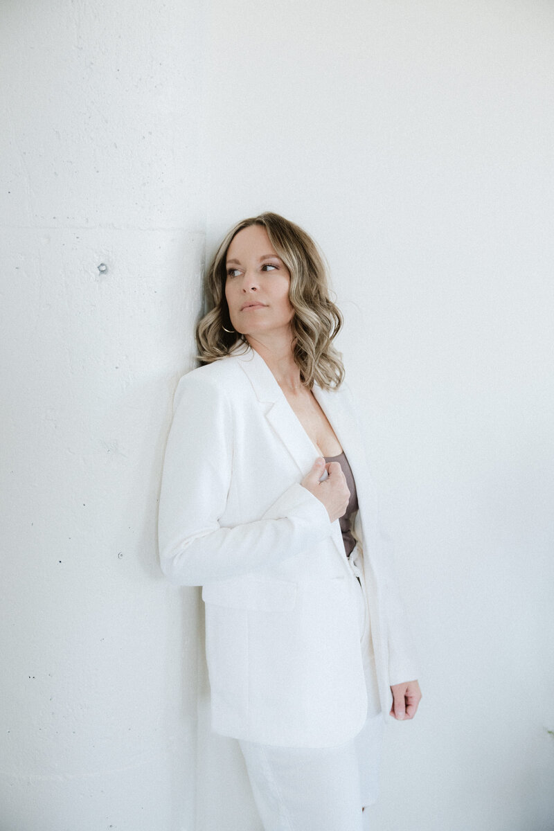 Empowered perimenopause and menopause coach embracing strength, balance, and natural wellness practices