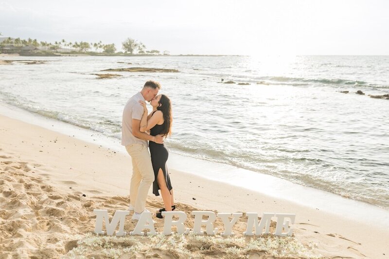 Romantic Beach proposal in topical flower circle