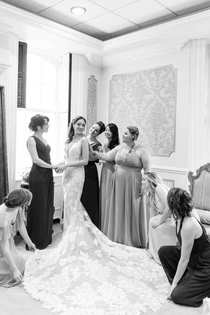 Bride and bridesmaids getting dressed at Snug Harbor for New York wedding day
