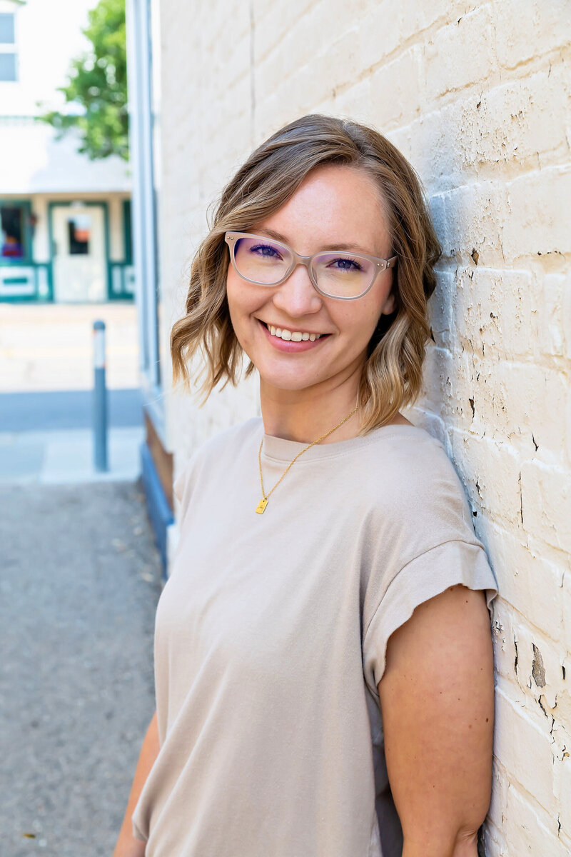 Elizabeth Rose, a holistic health coach and Registered Nurse, guiding individuals towards wellness through personalized, whole-body care and transformative healing practices.