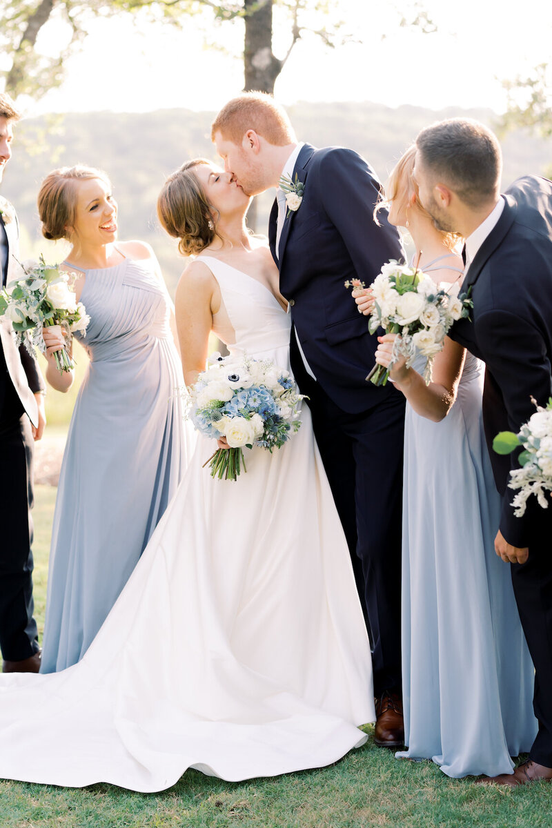 Wedding party photos beneath oak trees at Canyonwood Ridge