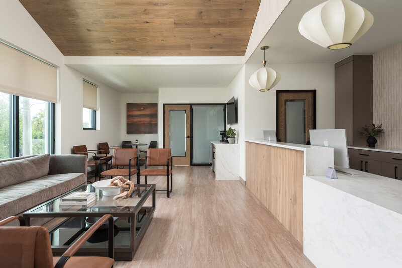 Leather chairs and lighting accents at Down to Earth project_Scarbro Design