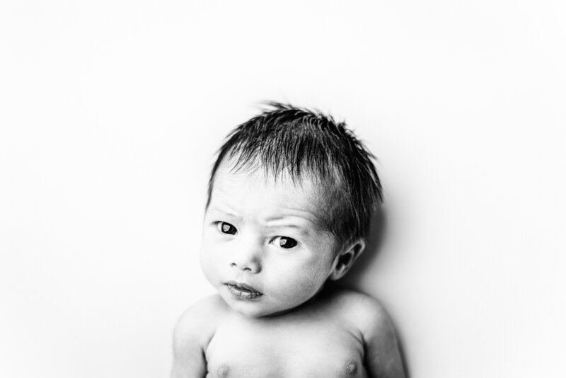 black and white personality portrait of a baby girl in a studio near traverse city