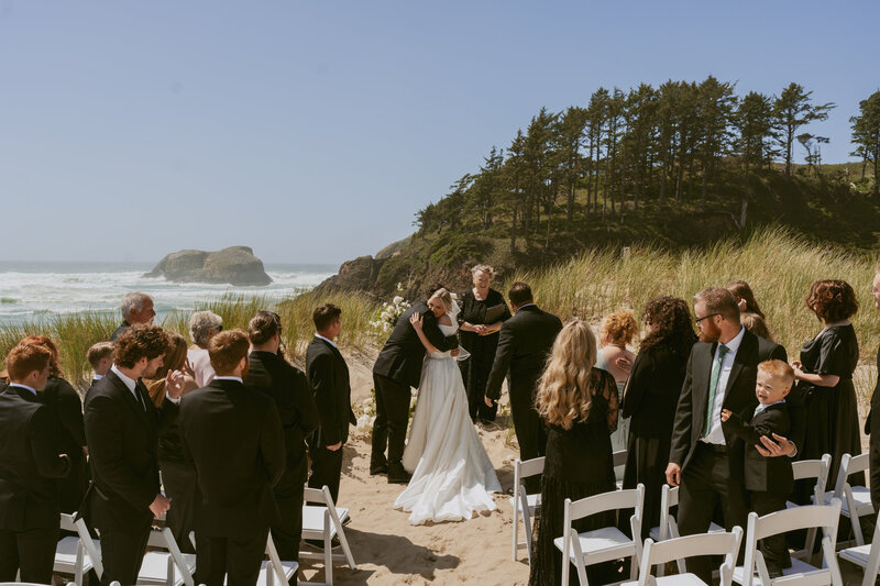 Couple in front of Oregon waterfall