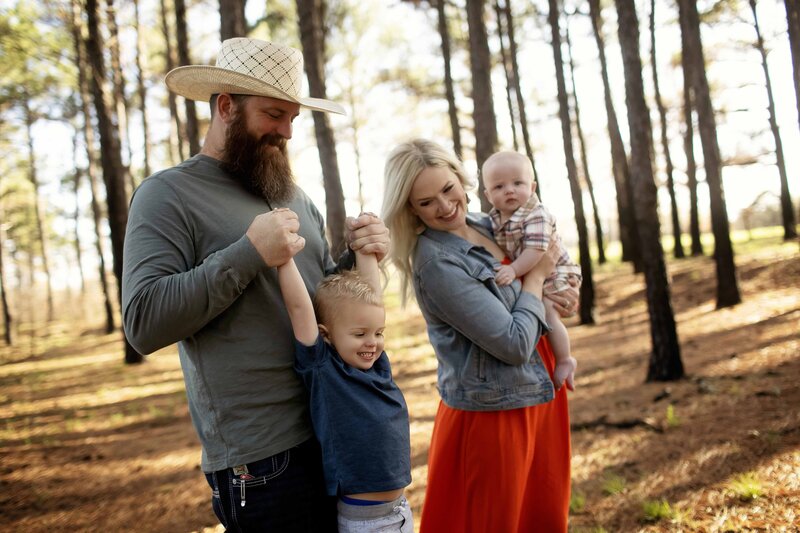 Dad and mom with two boys