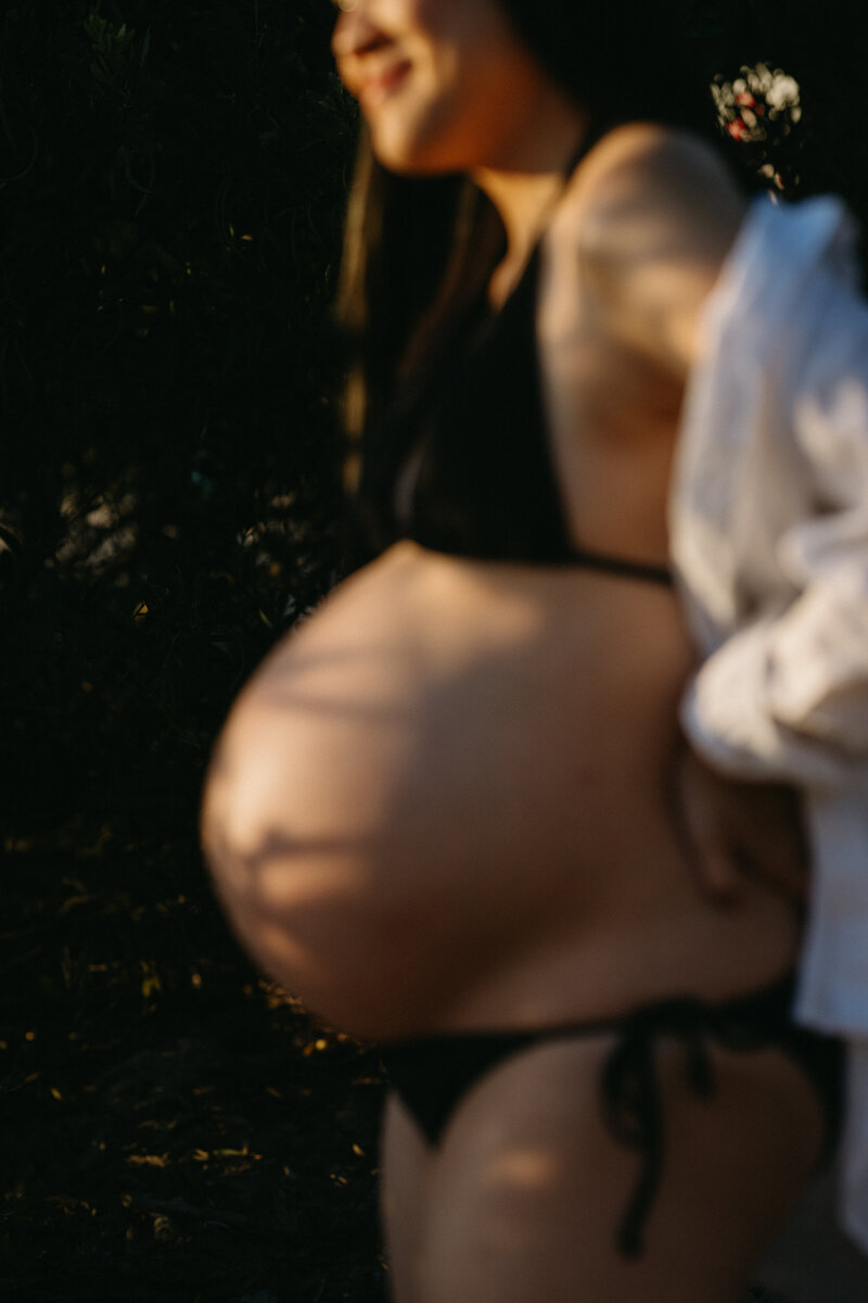 A beautiful maternity session of a mother near full term held at golden hour in Sydney.