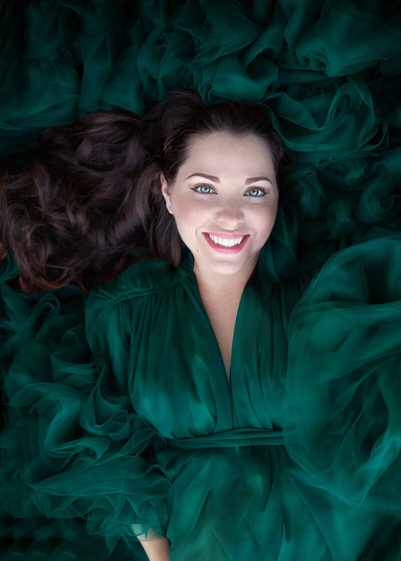 New Jersey Newborn Photographer Sarah Dubas  smiling in a green dress