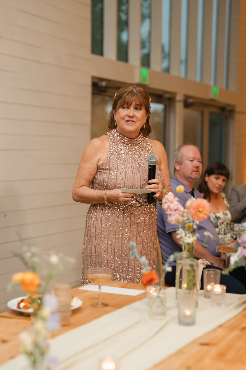 the mother of the groom wore a stunning gown to the wedding and gave an unforgettable wedding speech