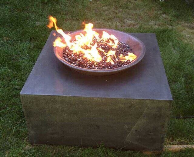 GFRC concrete fire bowl on cast concrete pedestal table