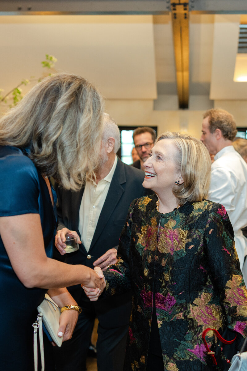 people shaking hands at a corporate function documented by an event photographer in NYC