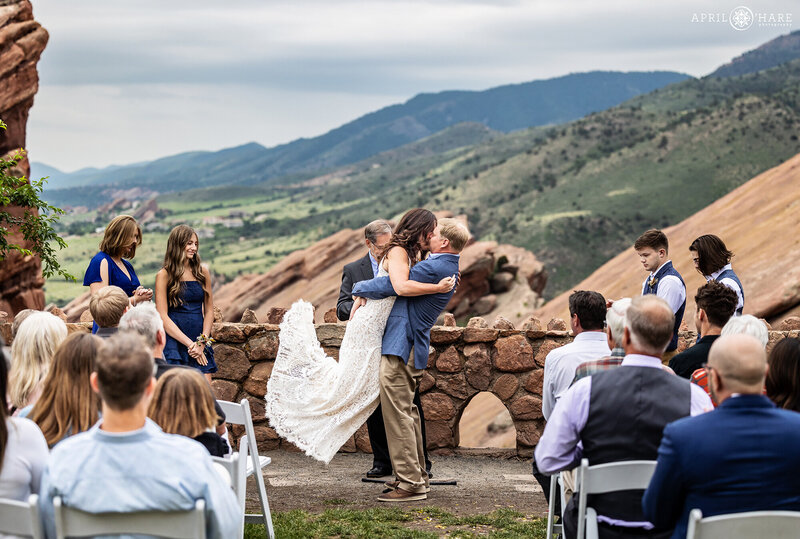 Cute Wedding Kiss at End of Ceremony at Red Rocks