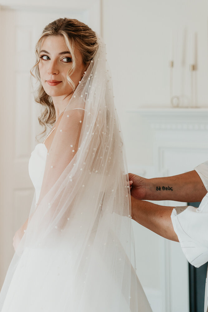 Bride looking over her shoulder