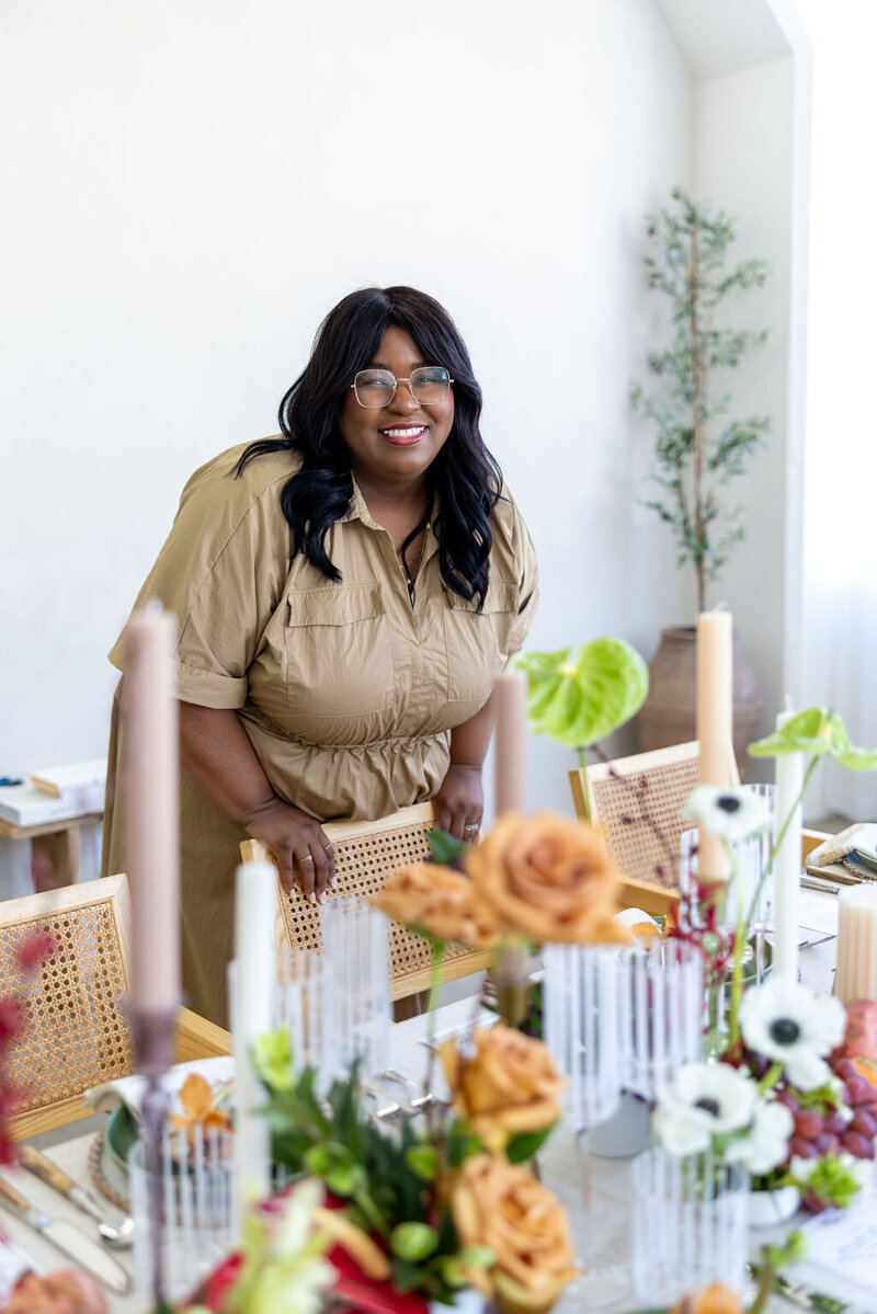 Professional headshot of a Los Angeles wedding planner, styled with modern elegance and a confident, welcoming presence