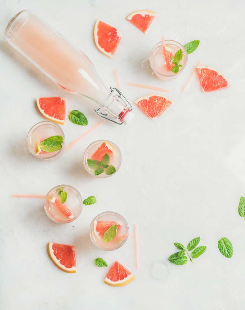 Grapefruit cocktails garnished with mint
